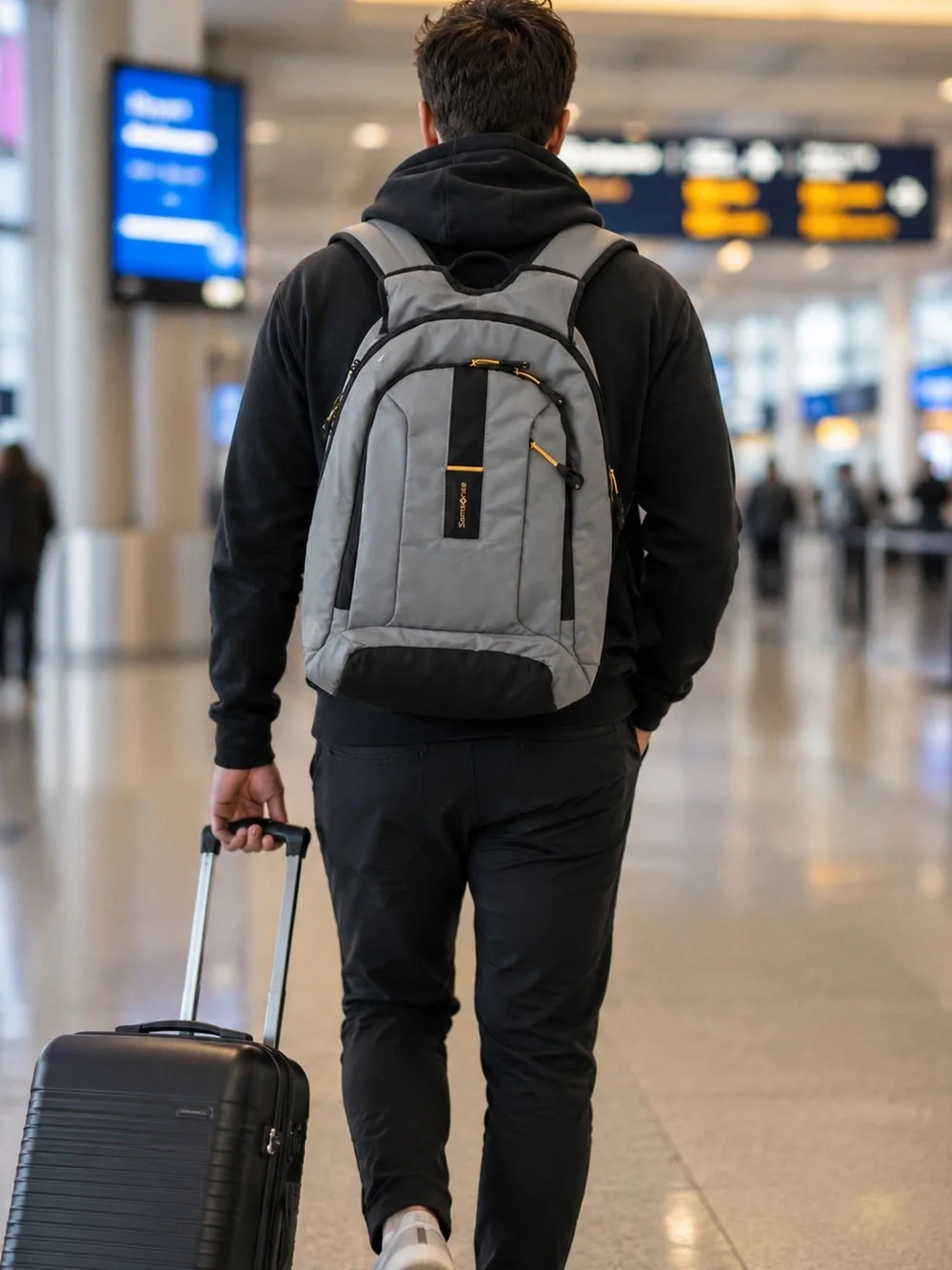 Samsonite Gray Backpack with Black Accents and Gold Zippers
